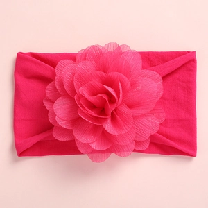 Vibrant rose red baby nylon headband with large textured chiffon floral decoration