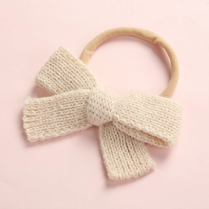 Soft knit baby bow headband with high-elastic nylon band for infants in cream white