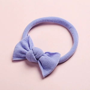 Bandeau bébé sans couture en nylon doux avec un joli nœud tricoté violet clair