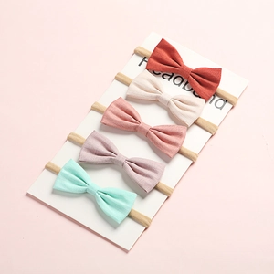 Set di 5 fasce per neonati con fiocchi in lino e morbide bande in nylon colori pastello