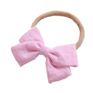 Bandeau bébé avec nœud rose texturé et bandeau en nylon élastique sans couture