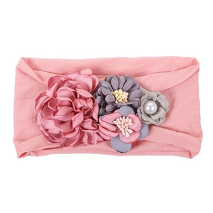 Bandeau élastique rose pour bébé avec bouquet de fleurs en soie et perle centrale