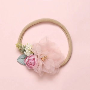 Pink floral baby headband with soft nylon band and delicate silk rose flower for infants