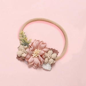 Detailed close-up of handmade pink mesh flower headbands for baby girls and toddlers