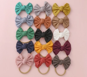 Lot de 15 bandeaux bébé en tricot côtelé avec nœuds colorés et nylon doux extensible