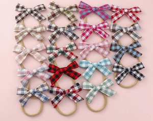 Detailed set of 20 multicolor plaid bow headbands with elastic nylon for infants
