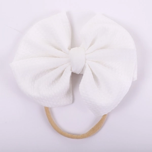 Detail of white waffle fabric baby bow headband with high-elastic nylon band