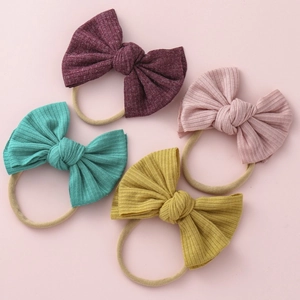 Lot de 4 bandeaux bébé avec nœuds en maille côtelée bordeaux, rose, vert et jaune en nylon