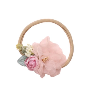 Soft nylon baby headband with large light pink chiffon flower and rose accents