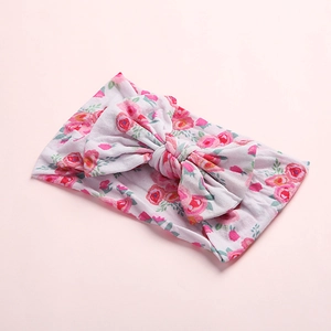 Bandeau bohème pour bébé avec grand nœud rose fleuri en nylon doux et extensible