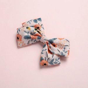 Blumendruck Haarschleife für Mädchen mit elegantem orange-gelben Blumenmuster Dekor