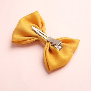Mustard yellow satin ribbon hair bow for girls with silver alligator metal clip
