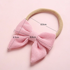 Pink corduroy bow baby headband with soft nylon elastic band for infants and newborns