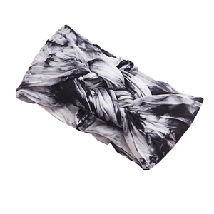 Soft tie-dye wide baby headband with black and white knotted bohemian print design