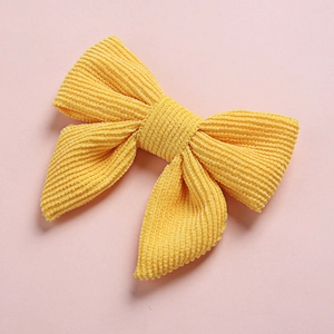 Barrette à cheveux nœud en velours côtelé jaune vif avec design en tissu texturé
