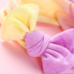 Fascia per capelli per neonati in maglia tie-dye con fiocco in vivaci colori giallo e rosa