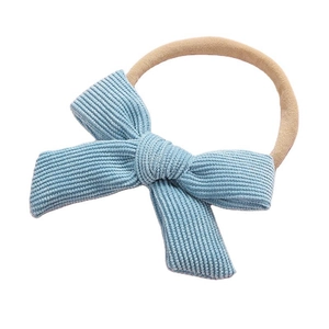 Bandeau à nœud en velours côtelé bleu clair avec bande élastique souple en nylon