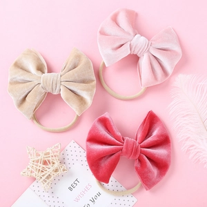 Dreiteiliges Set Samt Baby-Stirnbänder in Rosa und Champagner auf weichen Nylonbändern