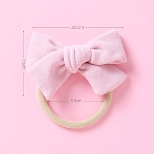 Détails du nœud en velours doux 10,5x7,5cm sur bandeau pour bébé en nylon
