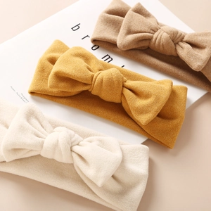 Lot de trois bandeaux pour bébé en cachemire synthétique avec nœuds en blanc, jaune et brun