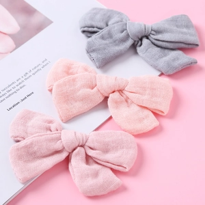 Set di 3 fermagli per capelli a fiocco in mussola rosa e grigio per neonati