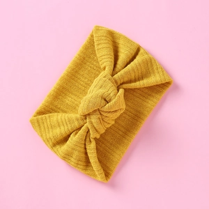 Gestricktes geripptes Baby-Stirnband mit Knotendesign in Ingwergelb für Kleinkinder
