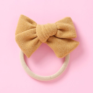 Bandeau à nœud en velours jaune moutarde pour bébés avec bande en nylon souple