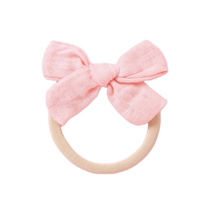 Bandeau bébé avec nœud rose en gaze de fibre de bambou et nylon extensible doux