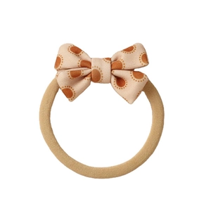 Retro style beige bow hair band with orange polka dots for kids hair accessories