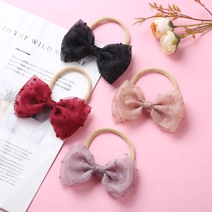 Lot de quatre bandeaux bébé en nylon ultra-doux avec nœuds en résille à pois