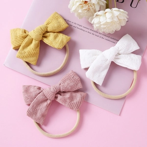 Bandeau à Nœud pour Bébé Fille en Tissu Maille Motif Gaufre Haute Élasticité pour Nourrissons Enfants Accessoires de Cheveux Quotidien