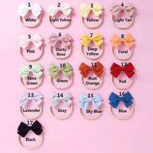 Detail view of 17 colors soft jacquard baby bow headbands with elastic nylon hair bands