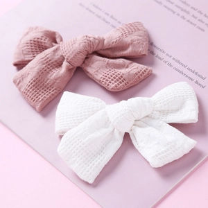 Handmade sweet cotton grid pattern bow hair clips for girls in pink and white colors