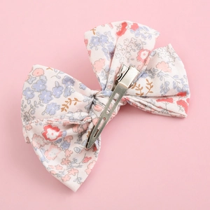 Soft nylon baby headband with floral cotton bow and sturdy silver metal duckbill clip