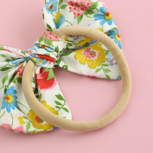 Floral cotton bow hairclip with seamless elastic band for girls and toddlers