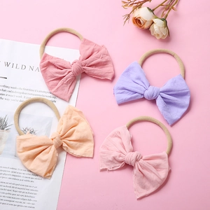 Lot de quatre bandeaux à nœud en nylon doux pour bébés aux couleurs pastel macaron