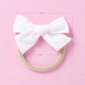 Bandeau pour bébé en coton doux avec nœud texturé et élastique pour nouveau-nés