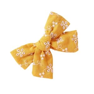 Handmade yellow cotton lace hair clip with white daisy embroidery for party girls