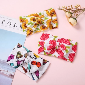 Baby hoofdbanden set met grote strikken in bloemen-, zonnebloem- en vlinderprints