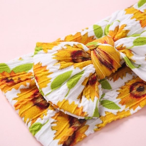 Bandeau élastique pour bébé en nylon avec imprimé tournesols et grand nœud en tricot