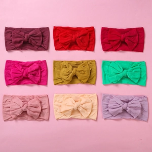 Nine-piece set of soft elastic nylon baby headbands with large bows in various colors