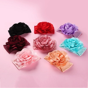 Set of 8 colorful baby nylon headbands with large 3D layered fabric flower decorations