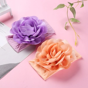 Soft nylon baby headbands with large 3D chiffon flowers in light purple and peach pink