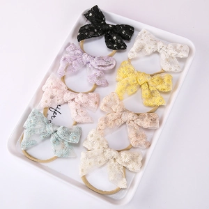 Lot de 7 bandeaux bébé en nylon avec nœuds en dentelle brodée de fleurs colorées