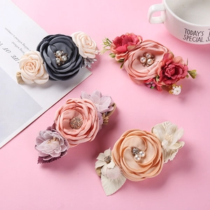 Detailed set of handmade fabric flower hair clips for girls with pearls and rhinestones