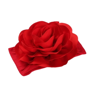 Baby nylon headband with a large vibrant red 3D fabric flower for girls and infants
