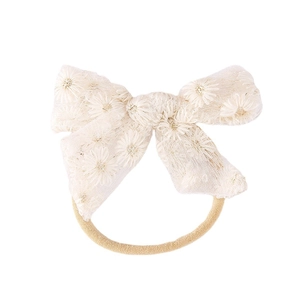 Bandeau en dentelle blanche avec nœud papillon et broderie marguerite délicate pour filles