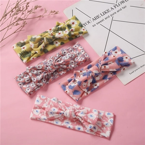Détails de quatre bandeaux élastiques en coton pour bébé avec motifs floraux