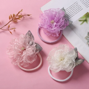 Lot de trois bandeaux bébé avec fleurs en maille en violet, rose et blanc en nylon