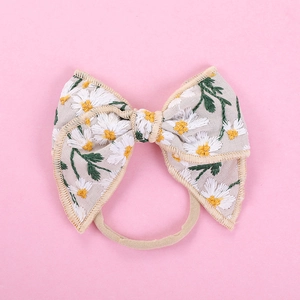 Daisy embroidered linen bow headband with soft nylon band for babies and girls